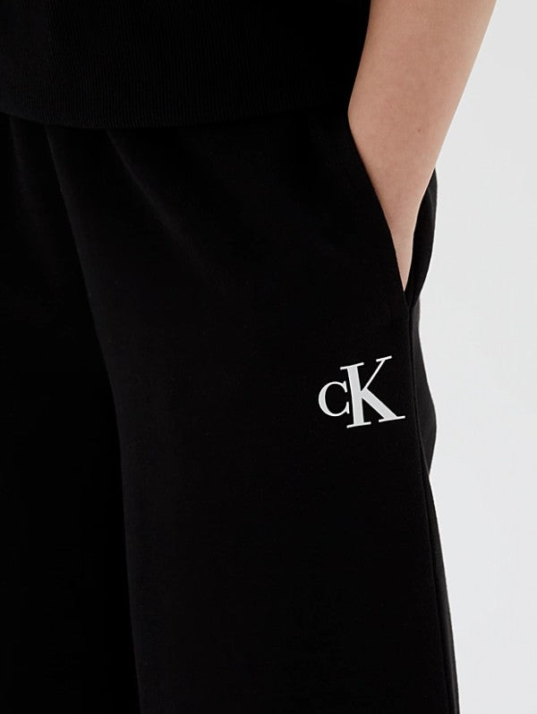 AM Kids - Pantaloni della tuta ampi in cotone garzato